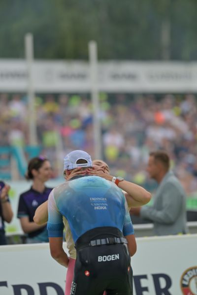 Athletes at the finish line of the 2026 DATEV Challenge Roth