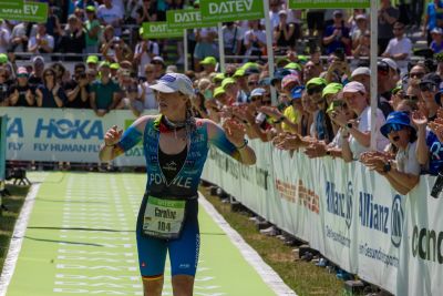 Athletes at the finish line of the 2026 DATEV Challenge Roth
