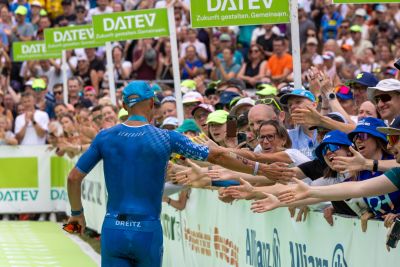 Athletes at the finish line of the 2026 DATEV Challenge Roth