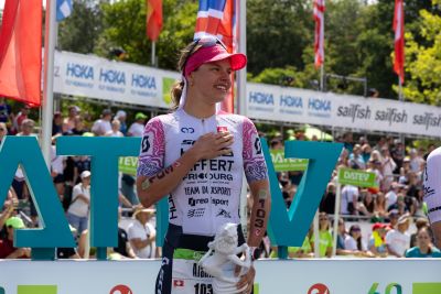 Athletes at the finish line of the 2026 DATEV Challenge Roth