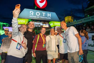 Athletes celebrate the 2026 DATEV Challenge Roth at the stadium
