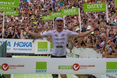 Athletes at the finish line of the 2026 DATEV Challenge Roth
