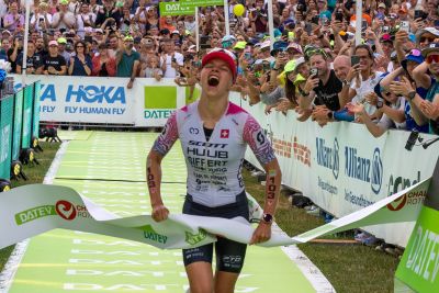 Athletes at the finish line of the 2026 DATEV Challenge Roth