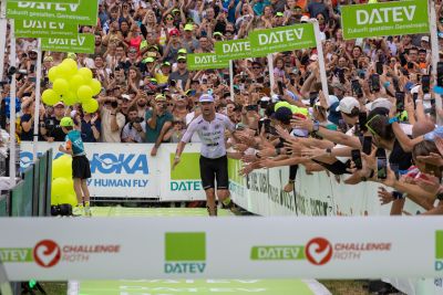 Athletes at the finish line of the 2026 DATEV Challenge Roth